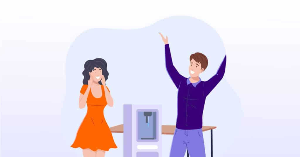 Man and woman happily discussing investment in energy-efficient equipment and appliances, focusing on eligibility for the energy-efficient appliance credit.
