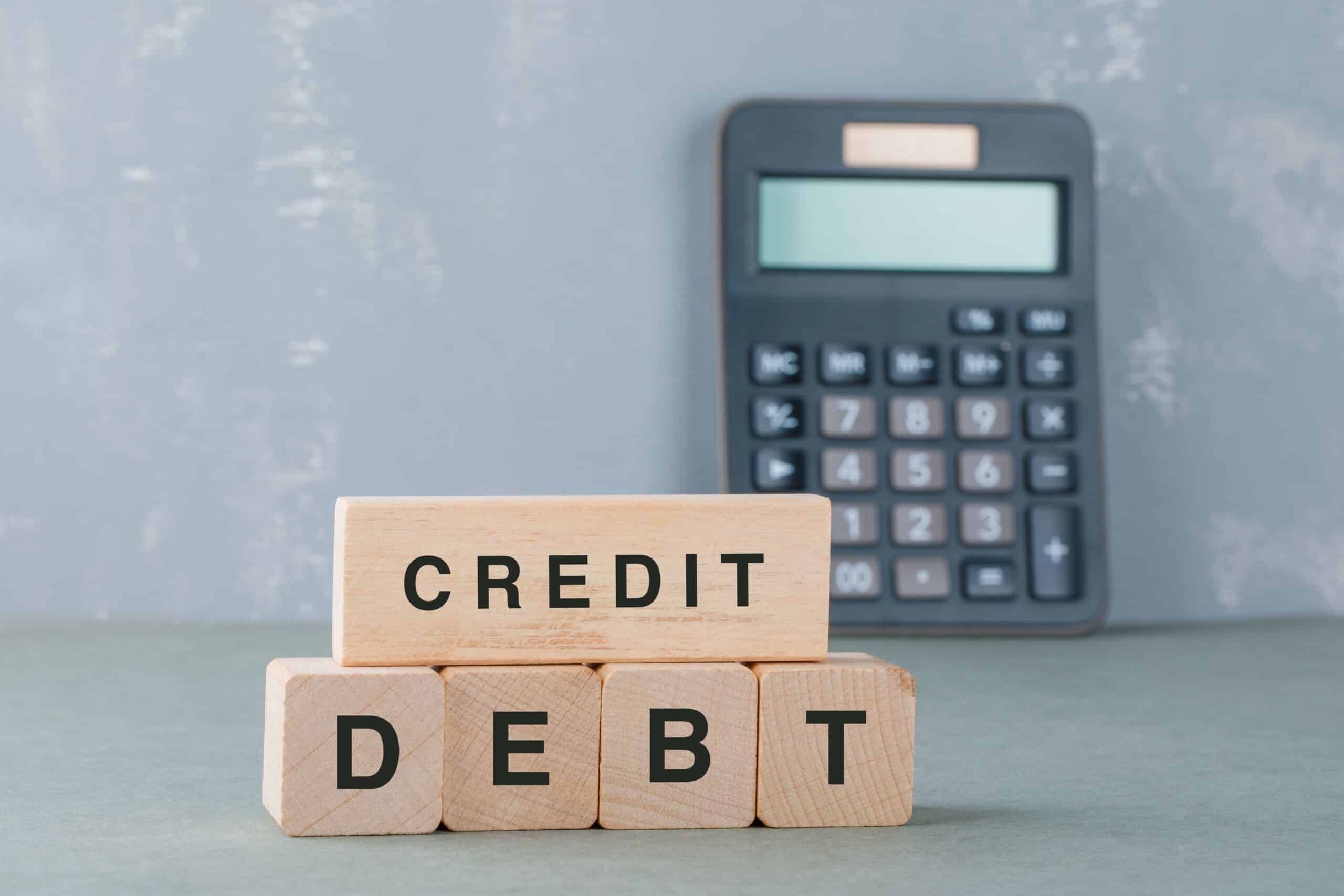 Calculator displaying tax deductions and credits, used for financial planning and tax calculations.
